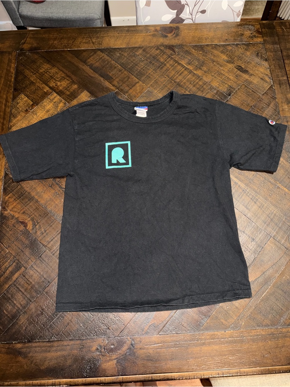 Champion Graphic Tee with Teal Logo